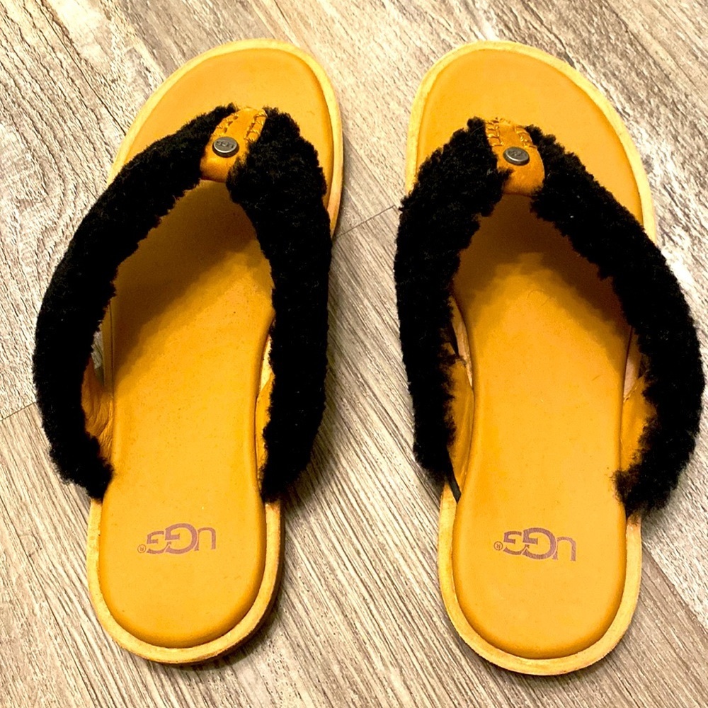 Brand new Ugg flip flops with black shearling